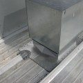 Securing Metal Panels and Flashing for Commercial Roofing